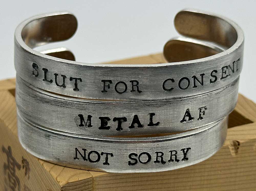 Stamped Metal Bands by Salty Jewelry Stamped Metal Bands by Salty Jewelry